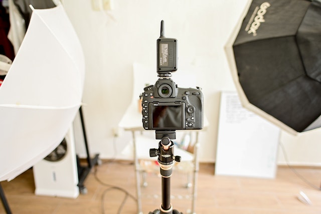 photography lighting set up with a professional camera on a tripod